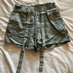 Green linen shorts